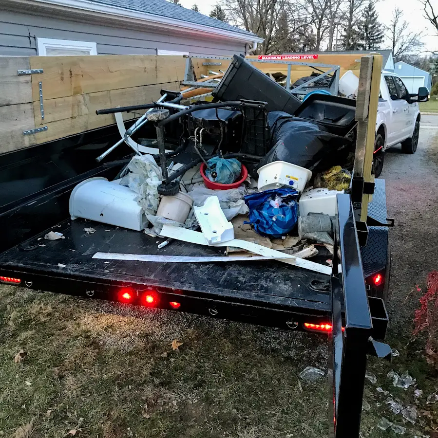 Roll-off dumpster delivered to a residential driveway in Alexander